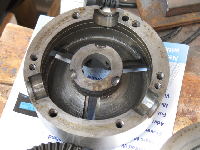 The scroll fits within a reasonably complex casting.
