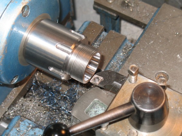 Machining the tapered bore using a cermet insert.  These make an excellent finish.