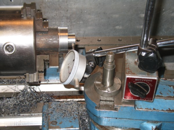 Using a machined step and trig to set the cross slide angle.  I measured the diameters, and then calculated how far the top slide had to move to get a zero reading on the other step.  It takes time to set up, but provides very accurate results.