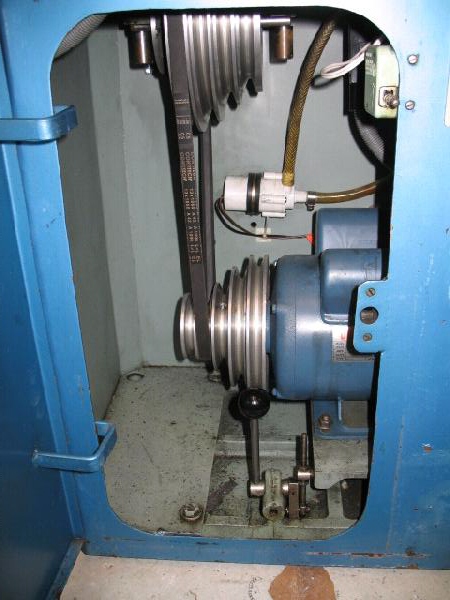 The standard motor and pulley set.  Note that the standard belt driven Denford coolant pump has been replaced with a windscreen washer pump.