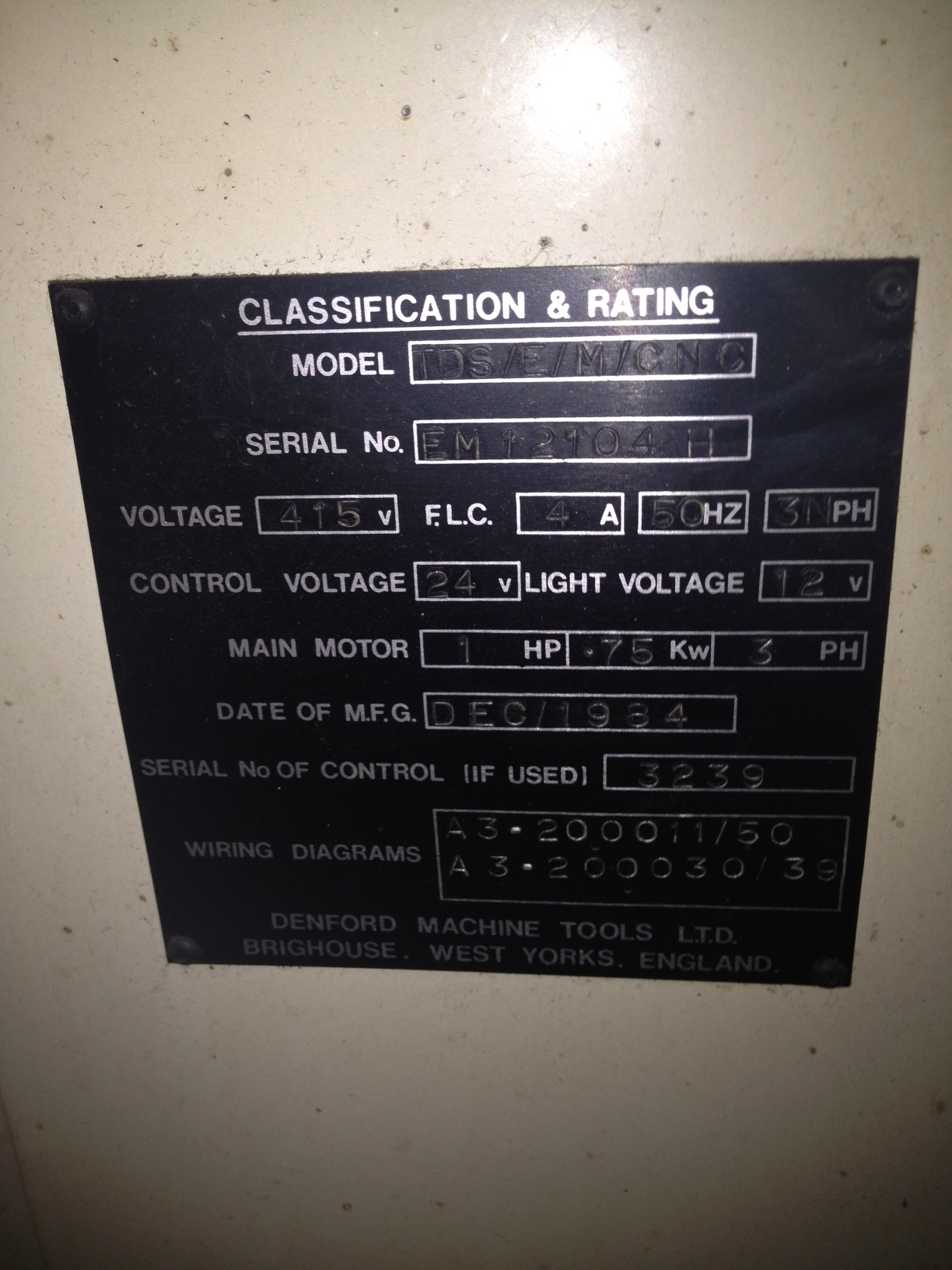Specs plate attached to the side of the machine.