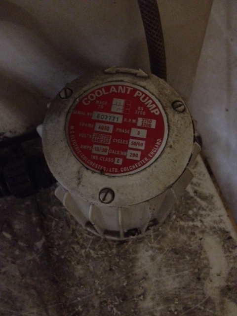 The coolant pump motor plate.