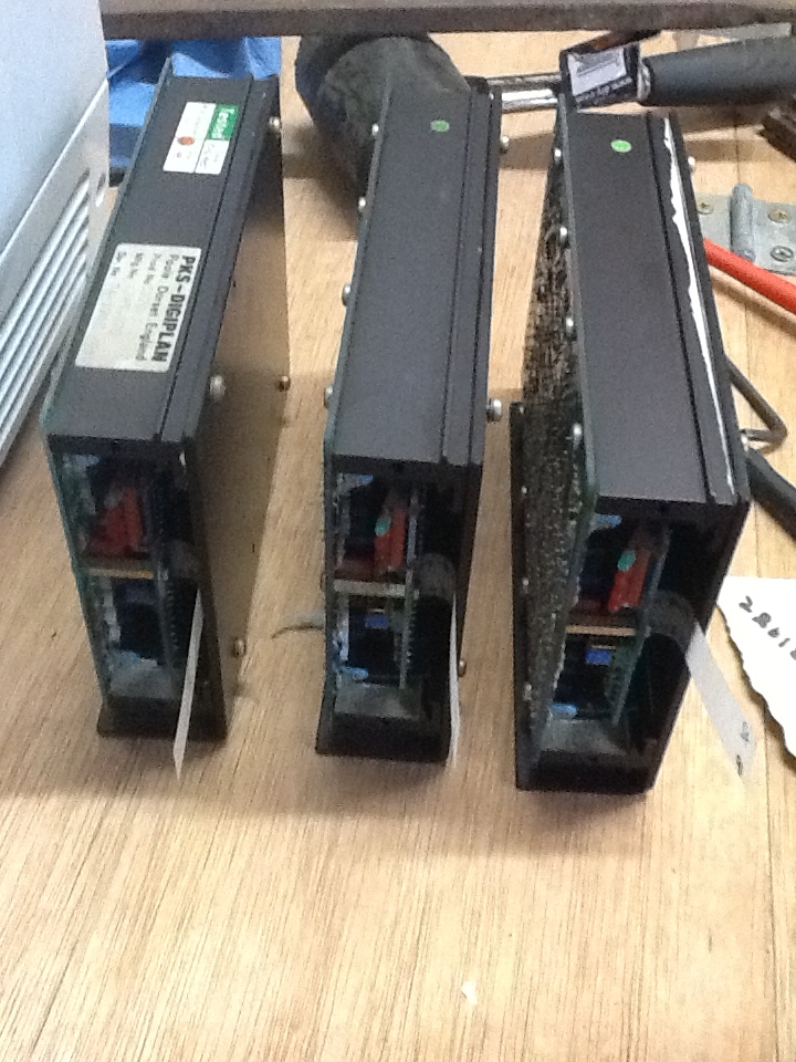 The three stepper driver boards removed from the control box.