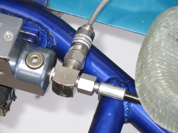 The hydraulic adapter fitted to the kart brake system.