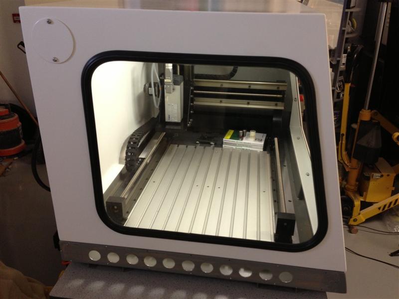 This has vents for venting out dust, there are similar holes in the other end of the machine in the bottom, if not used could easily be blanked off with some sheet or even ali tape.