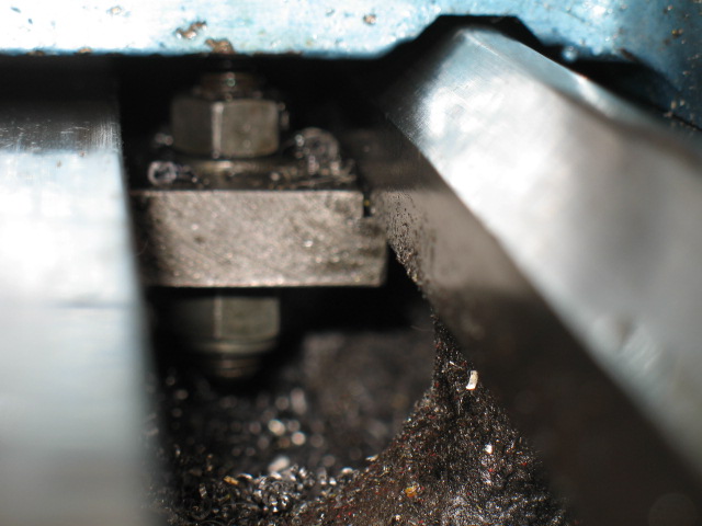 A close up of the metal piece. Note the step in the side.