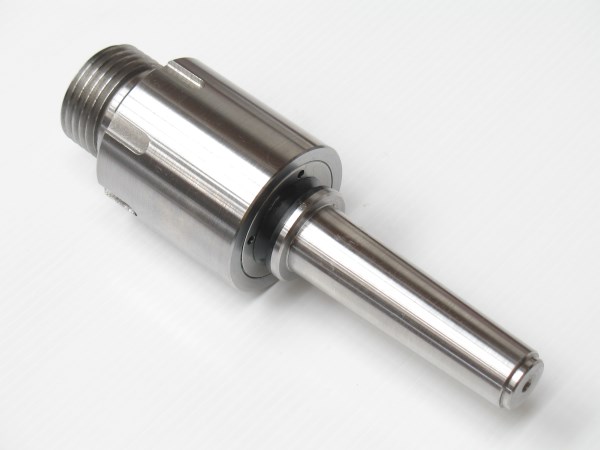 The black band in the centre is a lip seal protected from damage by a small flange.