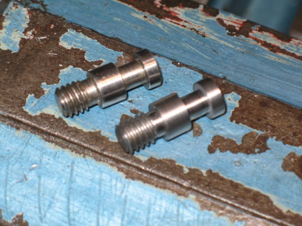 Anchors for the springs.  One of the first things I ever made on the lathe.