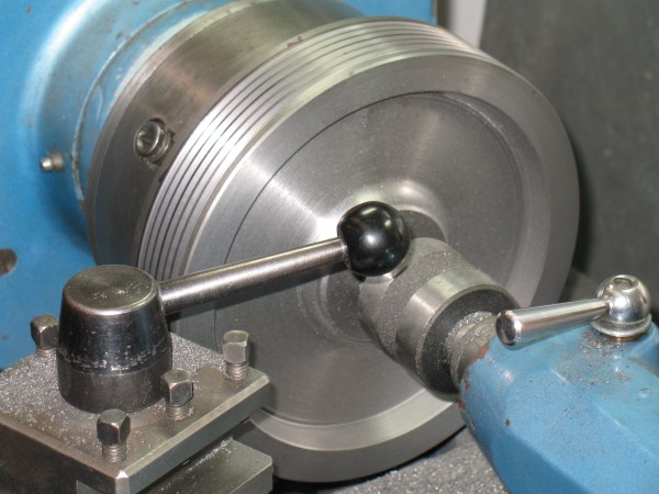 The pulley had a tapered and keyed bore.  I had no choice but to make it.