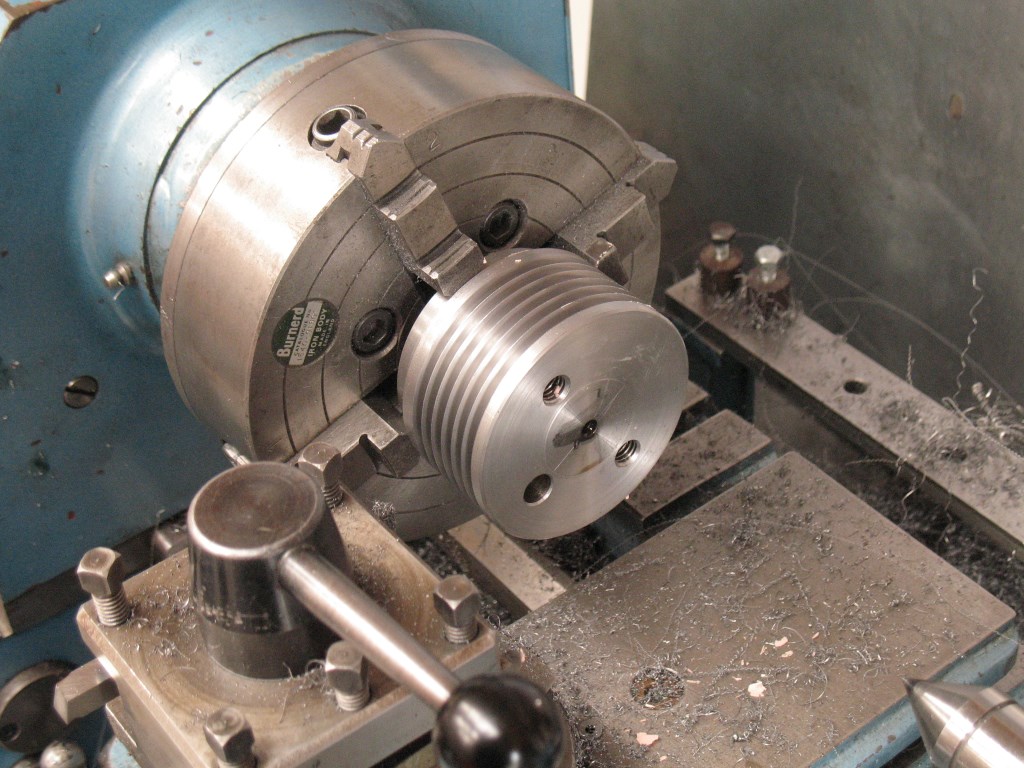Turned from solid 75mm bar.  It is very important to get the holes in the right place.