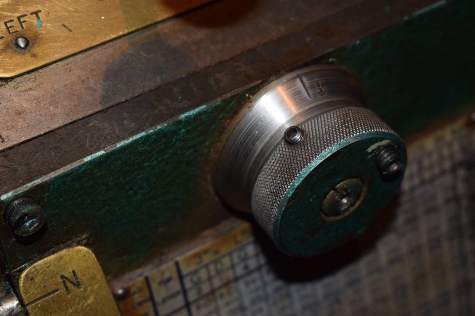 Hi me again (not so smart Art LOL) After trying to get my head round the different feed setting. following the directions in the denford Manual my selector dial stopped turning and is now stuck I have released the two grub screws and the centre slotted nut but it wont budge.  I think something inside the gearbox is jamming.  My Q. is how to take off the front plate of the G Box and is this feasible.  Any help welcomed