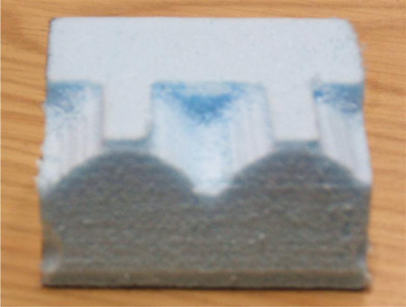 A little blurred but it does at least show where the curves should be on the front (but machine is not cutting all the way through).