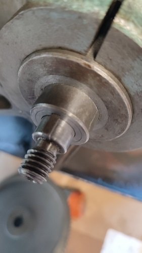 Screw gear shaft with bush fitted. Bush touches and rotates against lathe body