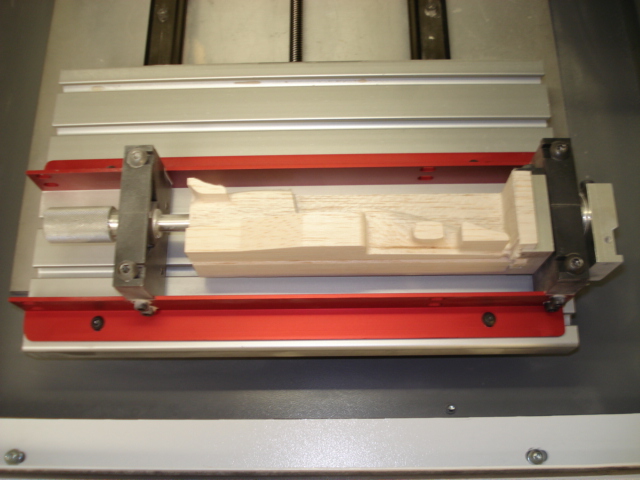 Loosen the straps that hold the F1 block assembly to the jig.