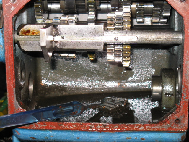The gearbox partly disassembled to allow access for cleaning.